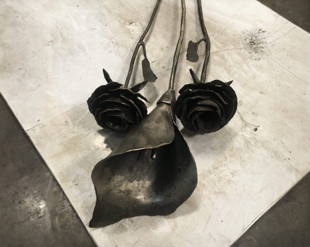 A metal rose crafted by a master metalworker.