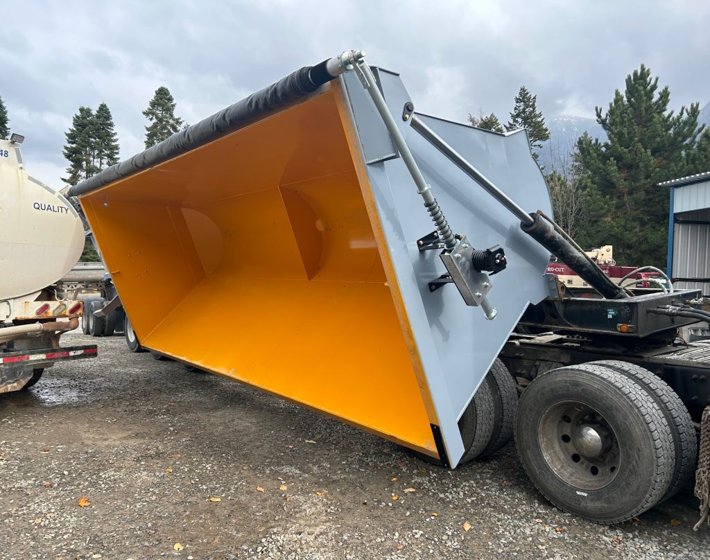 A large hydraulic industrial dumper.